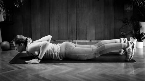 Premium Photo | Woman doing high-intensity interval training at home woman doing burpee