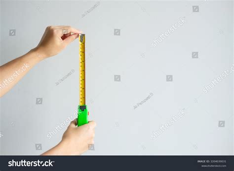 Man Hand Using Tape Measure Measuring Stock Photo 2204030031 | Shutterstock