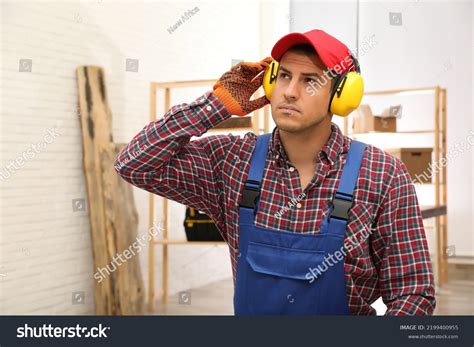 Worker Wearing Safety Headphones Indoors Hearing Stock Photo 2199400955 ...
