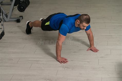 Athlete Man Doing Push Ups on Floor Stock Photo - Image of flexing, personal: 77418552