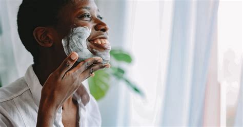 Person Applying Shaving Cream on Face · Free Stock Photo