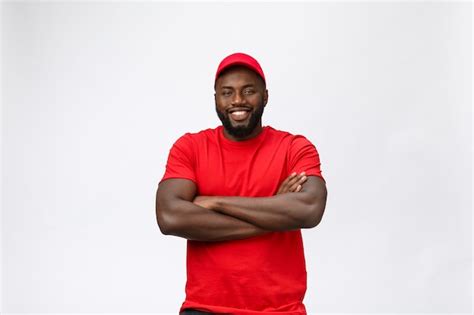 Premium Photo | Delivery service - handsome african american delivery ...