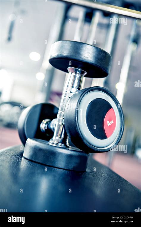diverse equipment and machines at the gym room Stock Photo - Alamy