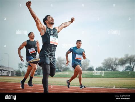 Your champion. a handsome young male athlete celebrating his win during ...