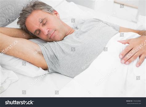 Man Sleeping Peacefully Home His Bed Stock Photo 145432882 - Shutterstock