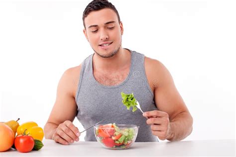 Handsome Young Man is Eating Healthy Food Stock Image - Image of lunch, beautiful: 57712937
