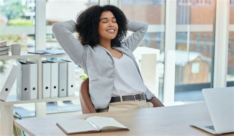 Premium Photo | Happy business woman stretching at desk for relax career success and work life ...