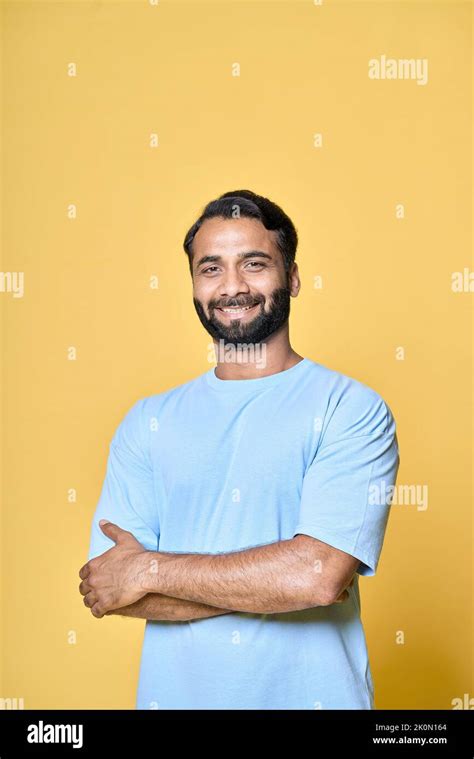 Indian man standing smiling hi-res stock photography and images - Alamy