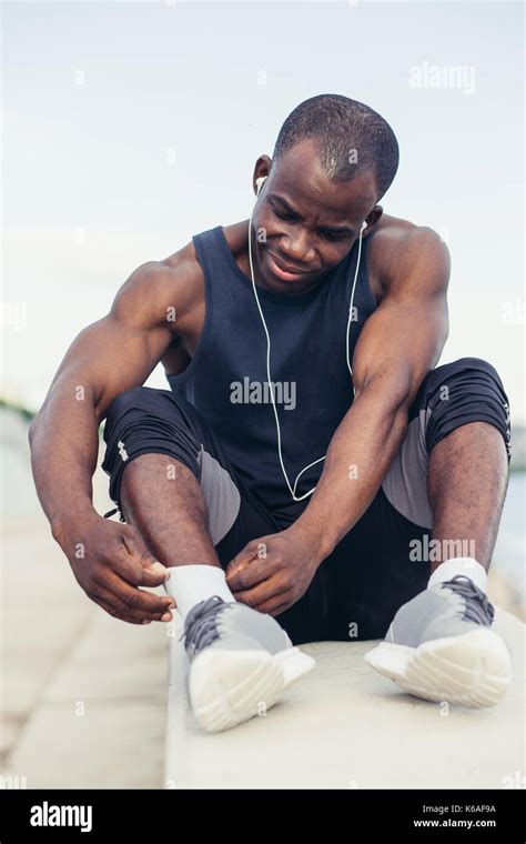Young Sport man resting after workout exercise Stock Photo - Alamy
