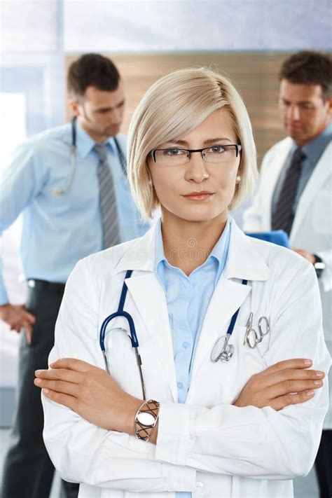 Doctors on Hospital Corridor Stock Image - Image of analysis, coat ...