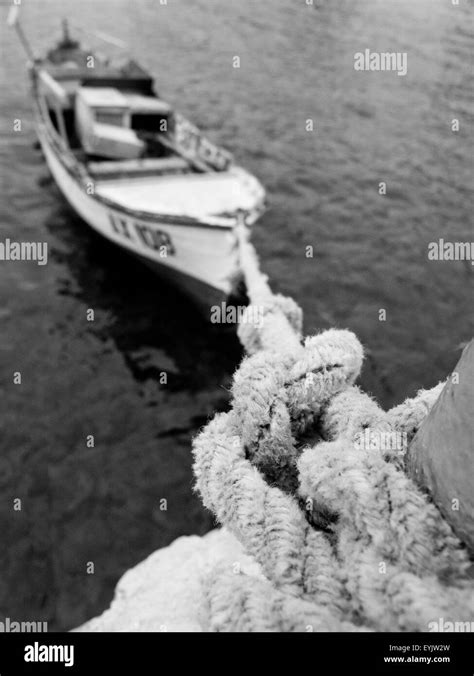 Small floating boat Black and White Stock Photos &amp; Images - Alamy