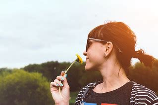 Woman with dandelion | Artem Beliaikin | Flickr