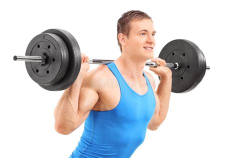 Man lifting a heavy weight stock photo. Image of athlete - 42597914
