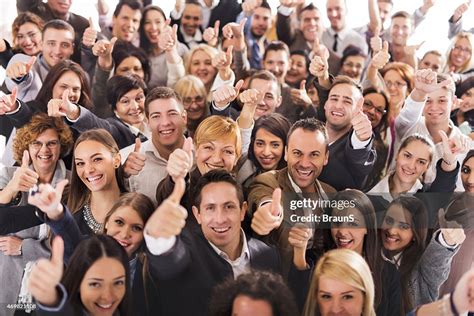 Large Group Of People Smiling And Giving Thumbs Up High-Res Stock Photo ...