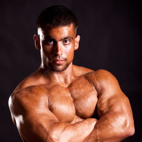 Young bodybuilder posing stock photo. Image of muscular - 39477378