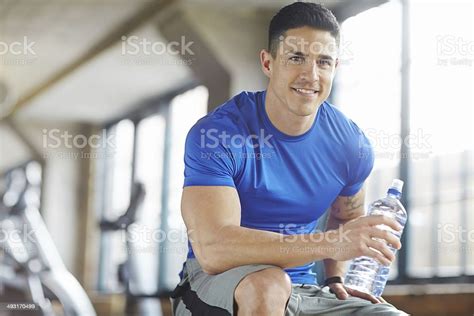 Staying Hydrated For His Next Workout Stock Photo - Download Image Now ...