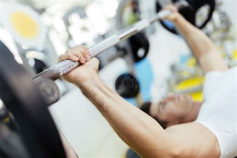 Handsome Man Lifting Weights in Gym Stock Image - Image of power, club ...