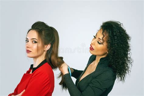 Girl stylist doing hair stock photo. Image of friend - 87445886