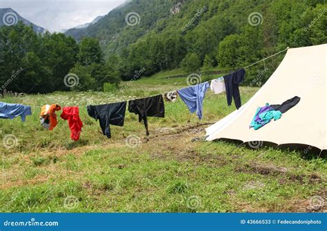 Drying Laundry To Dry Near the Camping Tents Stock Image - Image of ...