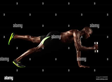 Athlete lifting weights Stock Photo - Alamy