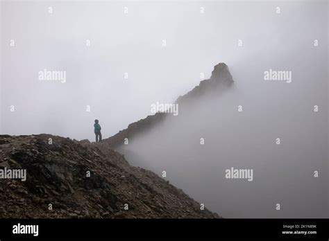 Hiker on mountaintop hi-res stock photography and images - Alamy