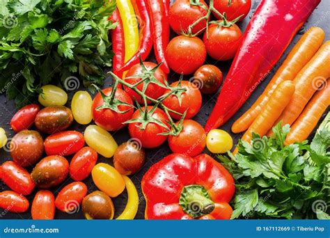 Assorted Fresh Colorful Raw Vegetables, Washed and Laid on a Kitchen ...