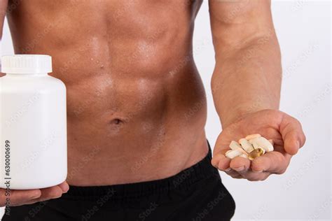 Sports, healthy eating and a healthy lifestyle. Young attractive man on ...