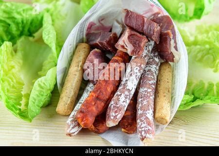 Assortment of sausages fuet, chorizo, jamon Stock Photo - Alamy