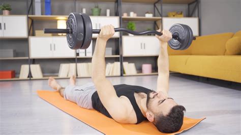 Athlete man lifting weights. 43824426 Stock Video at Vecteezy