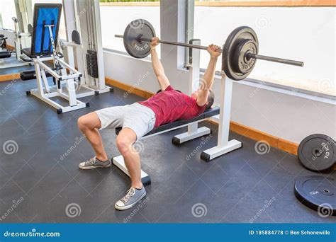 Young Caucasian Man Bench Press with Barbell Stock Photo - Image of lift, leisure: 185884778