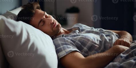 man sleeping peacefully in bed 44550604 Stock Photo at Vecteezy