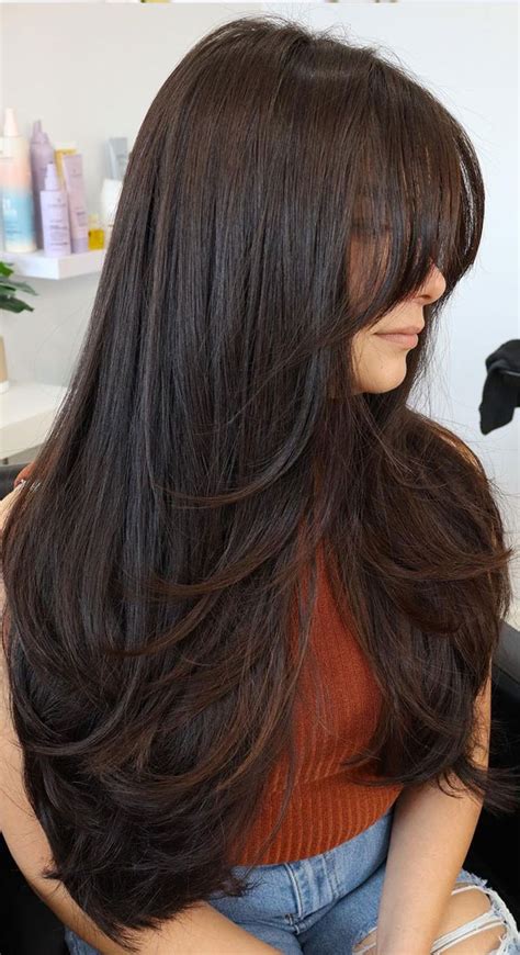 40 Long Layered Haircuts To Try Right Now : Layers with side-swept bangs