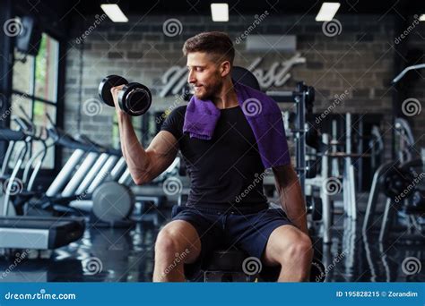 Close Up of a Muscular Young Man Lifting Weights in Gym Stock Image ...