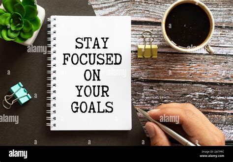 Inspirational quote - Stay focused on your goals. With text message on ...