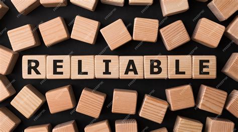 Premium Photo | Word reliable made with wood building blocks