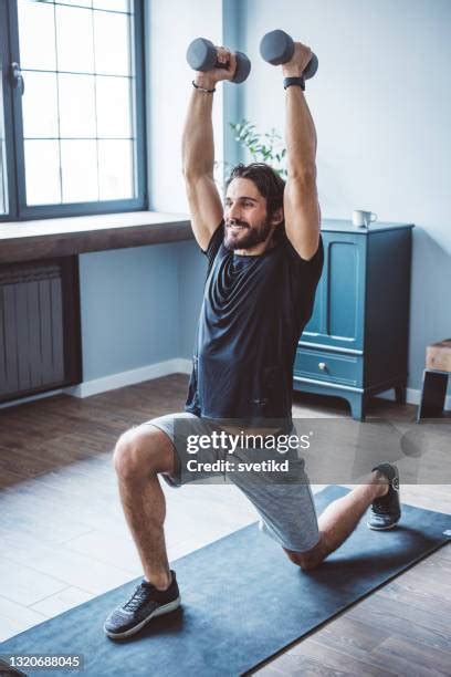 4,067 Man Exercising Weights Home Stock Photos, High-Res Pictures, and ...