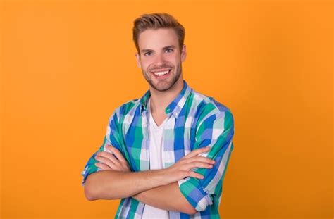 Premium Photo | Confident smile Confident guy portrait yellow ...