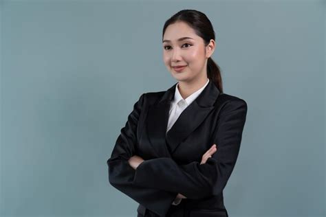 Premium Photo | Confident young businesswoman stands on isolated ...
