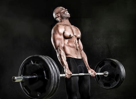Athlete Lifting Heavy Weights Stock Photo - Download Image Now - iStock