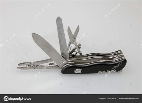 Black Swiss Army Knife Stock Photo by ©nechipas 179973310