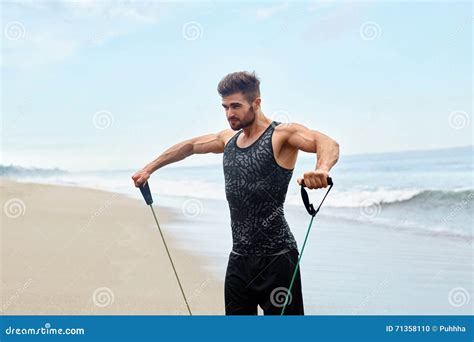 Man Exercising Outdoor, Doing Workout Exercise at Beach. Fitness Stock ...