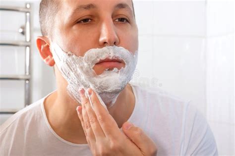 Man&amp; X27;s Face Applying Facial Foam, Close-up. Shaving Cream, Skin ...