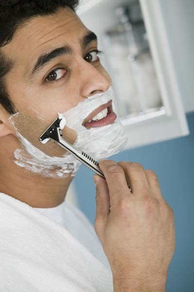 Man grooming with shaving cream in bathroom Free Stock Photo | FreeImages