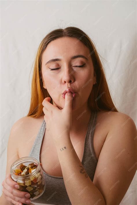 Premium Photo | Girl enjoying after eating a healthy snack