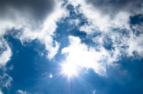 Sunlight With White Clouds · Free Stock Photo