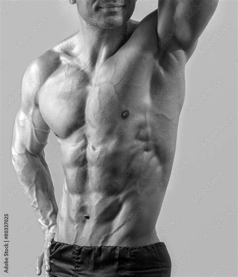 Strong bodybuilder with six pac, shoulders,biceps, triceps,chest Stock Photo | Adobe Stock
