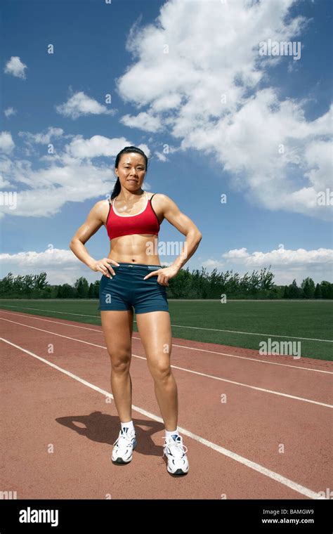 Portrait Of Athlete Standing On A Track Field Stock Photo - Alamy