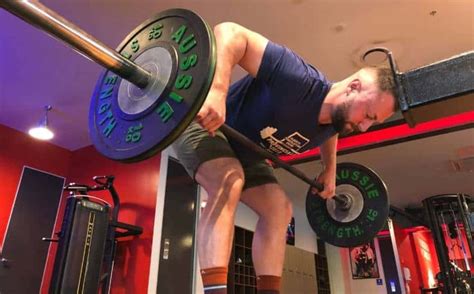 How often should men typically deload from heavy strength training to optimize recovery and prevent plateaus?
