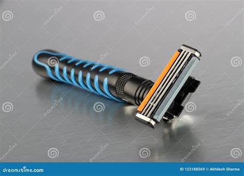 Razor Blade Closeup on Brushed Steel Background Stock Image - Image of object, silver: 123188569