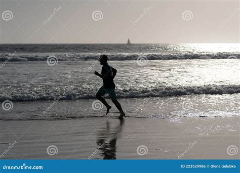 Healthy Man Running on Beach. Energetic Summer. Runner Feel Freedom ...